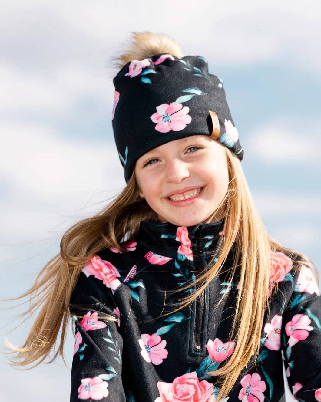deux par deux Girls Printed Jersey Detachable Pompom Hat - Black Rose Print