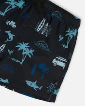 Load image into Gallery viewer, deux par deux Boys Printed Swim Trunks - Light Blue Beach On Black
