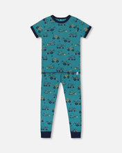 Load image into Gallery viewer, deux par deux Boys Organic Cotton Two-Piece Short Sleeve Top And Pant Pajama Set - Teal With Yellow Truck
