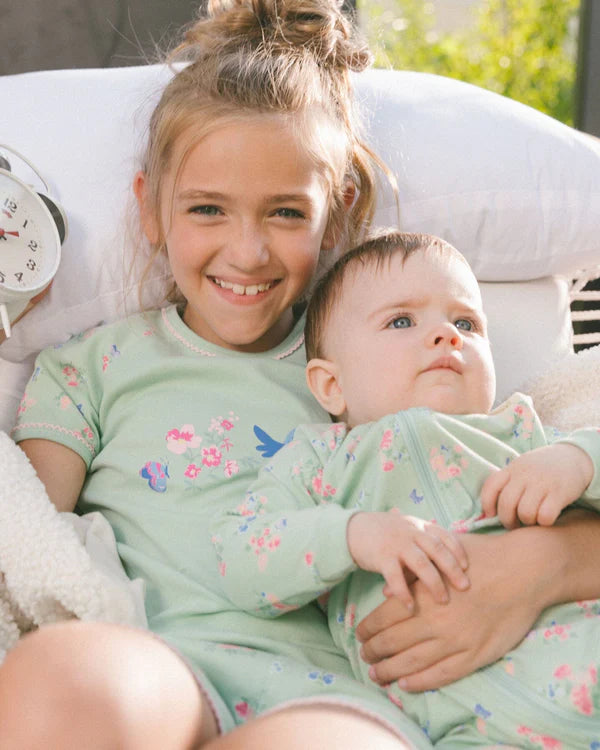 deux par deux Girls Organic Cotton Two-Piece Short Pajama Set - Small Pink And Blue Flowers On Light Sage