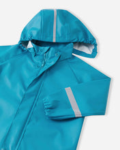 Load image into Gallery viewer, Reima Lampi Rubber Rain Jacket - Aquatic Blue
